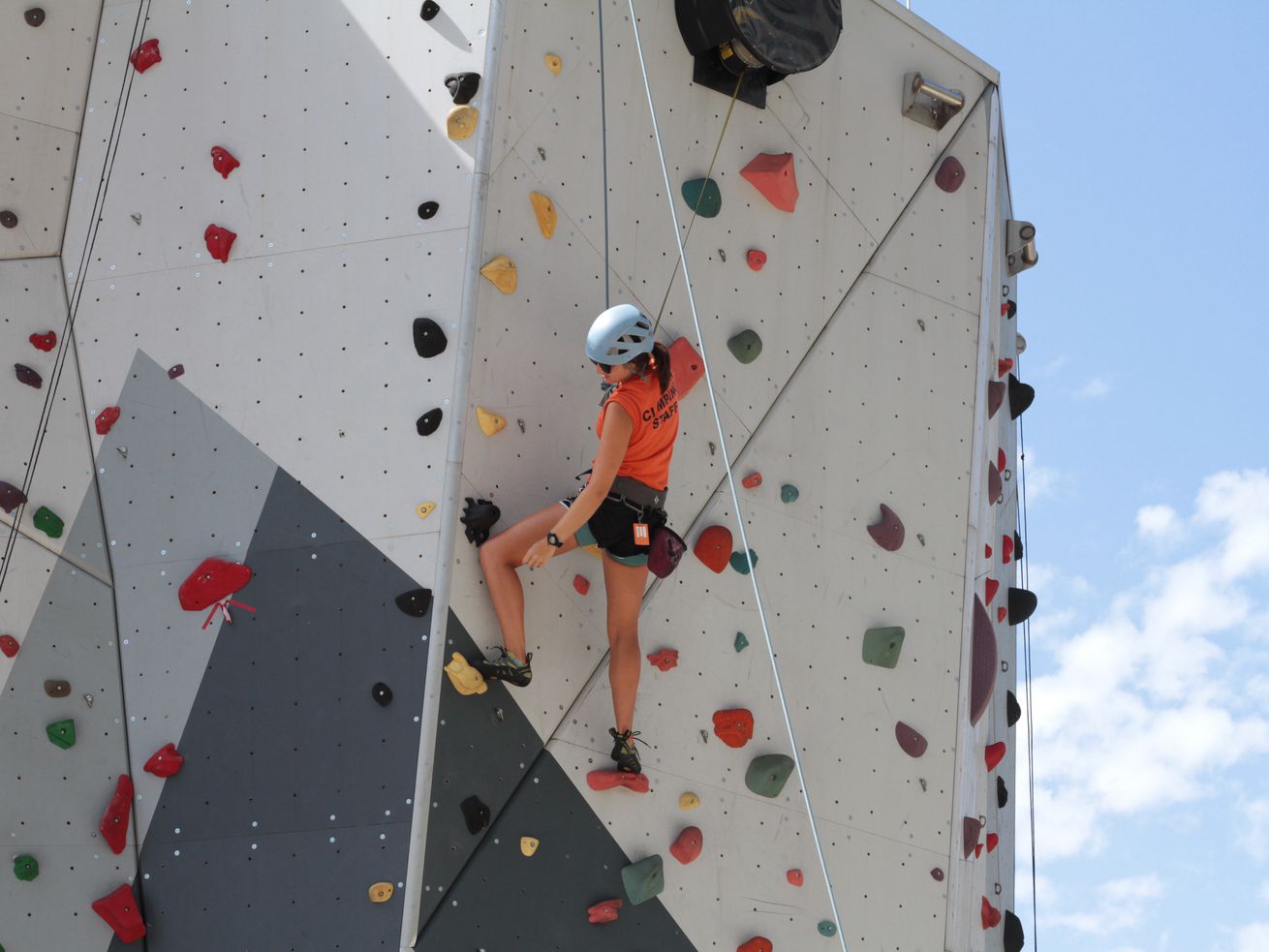 A park staff member scaling Maggie Daley park’s climbing wall on August 1, 2018.