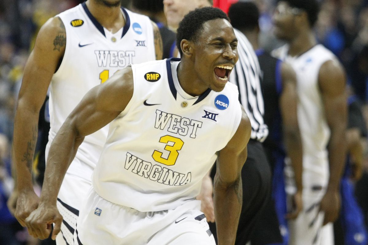 Guard Juwan Staten leads West Virginia into a Round of 32 match with Maryland. 