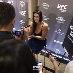 Mackenzie Dern talks to reports at UFC 224 media day Thursday in Rio de Janeiro.