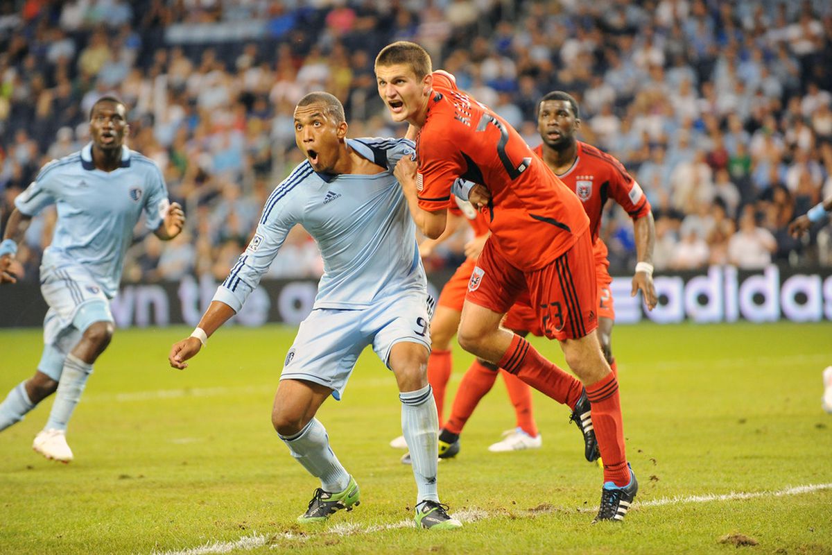 Teal Bunbury and Perry Kitchen battle for position in United's 1-0 loss to SKC earlier in the season