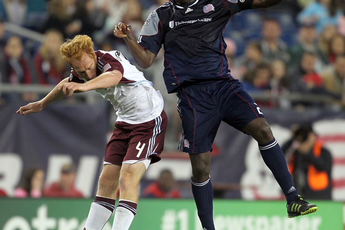 FOXBORO, MA - MAY 7: Jeff Larentowicz #4 of Colorado Rapids battles Shalrie Joseph #21of New England Revolution at Gillette Stadium on May 7, 2011 in Foxboro, Massachusetts. (Photo by Jim Rogash/Getty Images)