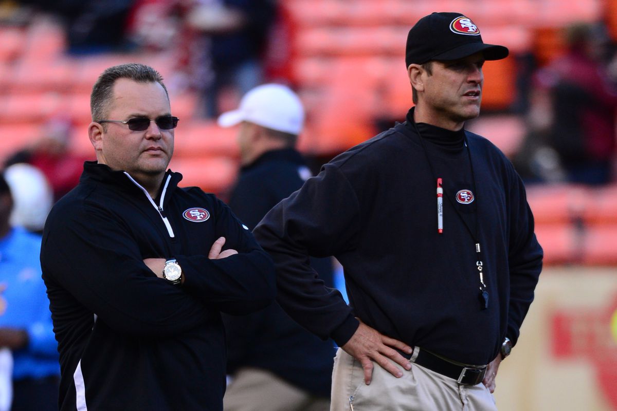 Roman and Harbaugh with their game faces on during pre game warm ups