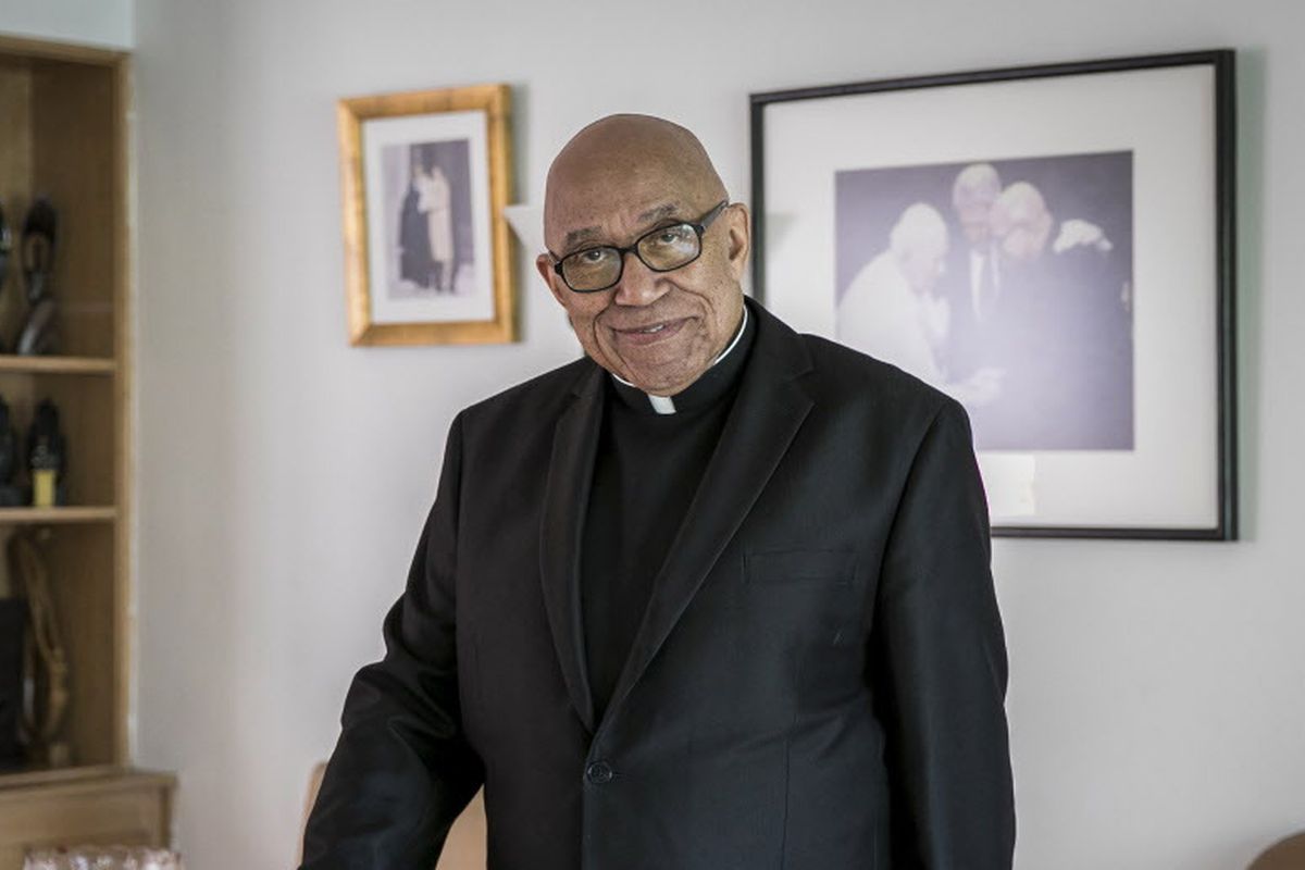 Father George Clements, 85, at his Evergreen Park home in 2017.