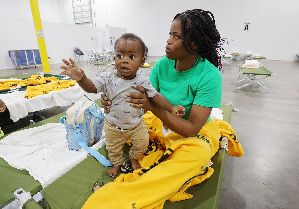 Refugee Jouseline Melayer, from Haiti via Chile, holds her baby, Jayden, at the Family Transfer Center in Houston in June 2021.