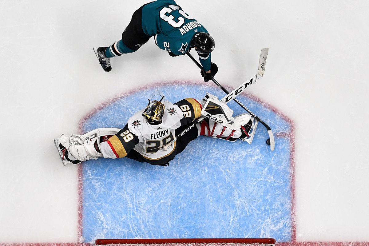 An overhead view as Barclay Goodrow #23 of the San Jose Sharks scores the game-winning goal against Marc-Andre Fleury #29 of the Vegas Golden Knights in Game 7 of the Western Conference First Round during the 2019 NHL Stanley Cup Playoffs at SAP Center on April 23, 2019 in San Jose, California