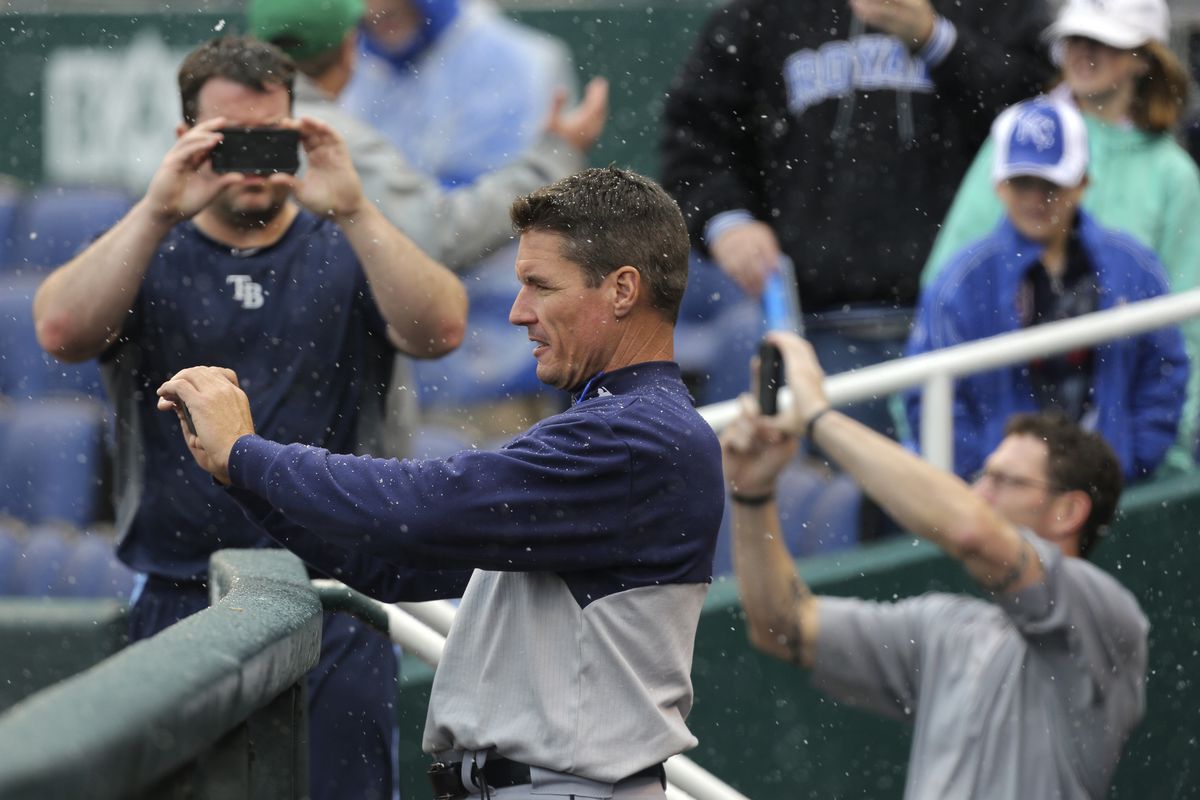 Rays Players and Coaches stepped out from the dugout to capture pictures of the snow. 