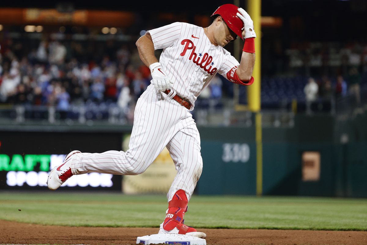 J.T. Realmuto #10 of the Philadelphia Phillies rounds the bases after hitting a two run home run during the eighth inning against the New York Mets at Citizens Bank Park on April 11, 2022 in Philadelphia, Pennsylvania.