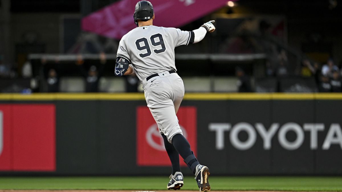 Aaron Judge of the New York Yankees gestures after hitting one-run home run during the seventh inning against the Seattle Mariners at T-Mobile Park on May 30, 2023 in Seattle, Washington.