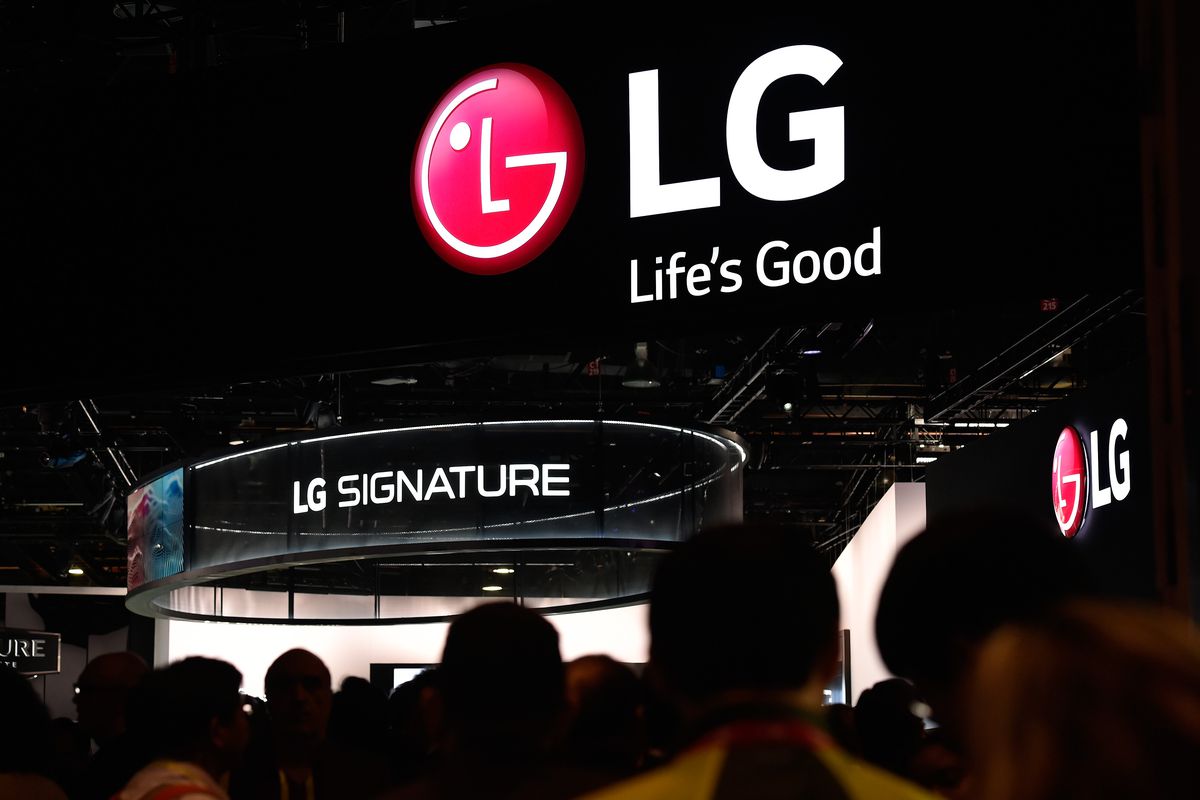 Attendees walk through the LG booth at CES 2016 at the Las Vegas Convention Center on January 6, 2016 in Las Vegas, Nevada.