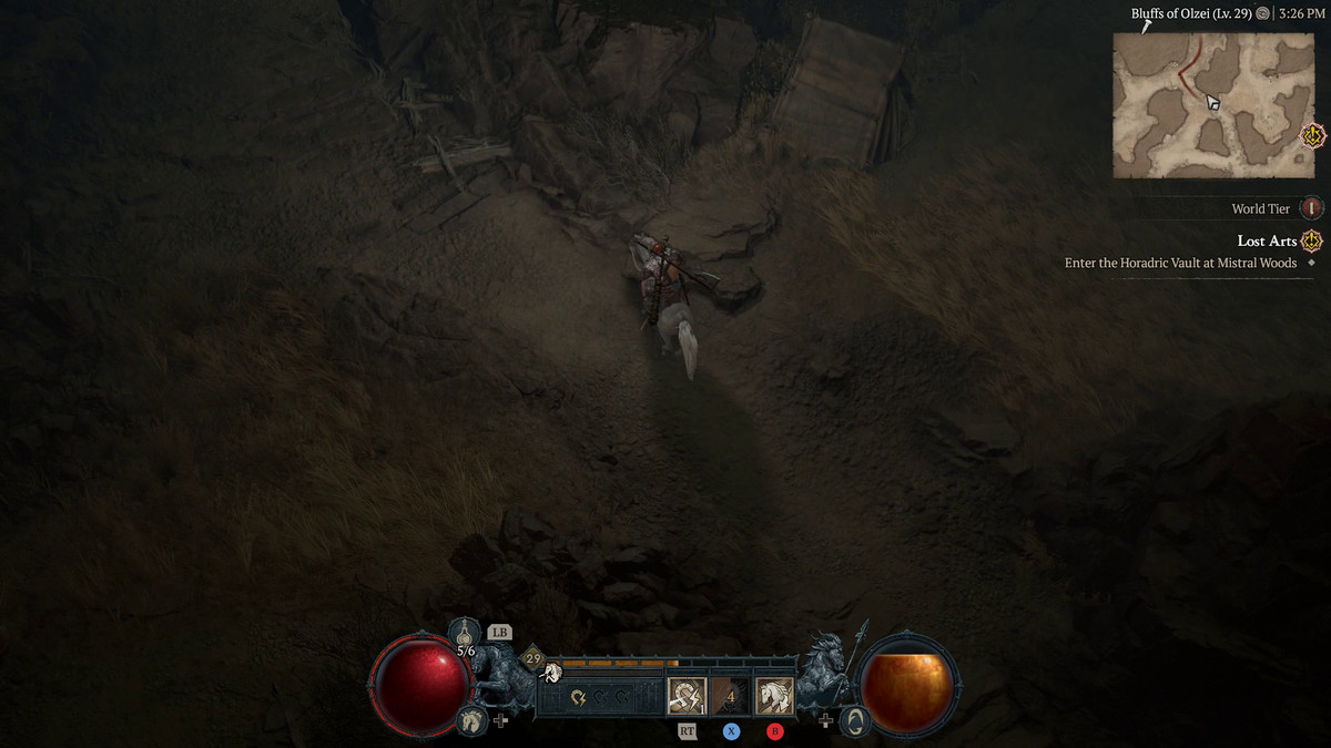 A player in Diablo 4 sits on a horse in the middle of the road