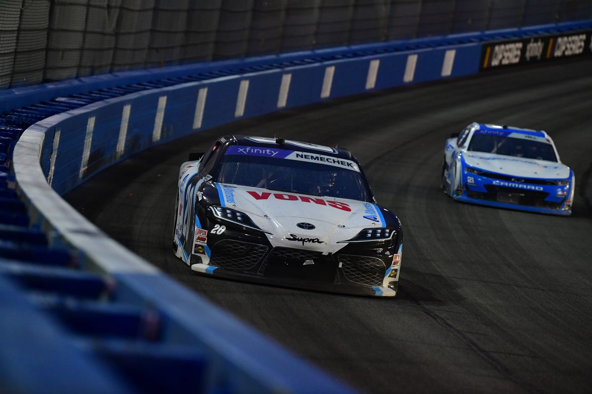 Xfinity Cup Series driver John Hunter Nemechek (20) leads driver Austin Hill (21) during the Series Production Alliance Group 300 at Auto Club Speedway.&nbsp;