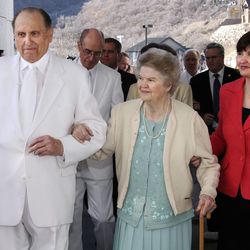 President Thomas S. Monson of The Church of Jesus Christ of Latter-day Saints; his wife, Frances, center, and their daughter, Sister Ann M. Dibb, second counselor in the Young Women general presidency of the LDS Church, walk out of the temple on the last day of the Draper Utah Temple dedication services Sunday, March 22, 2009.