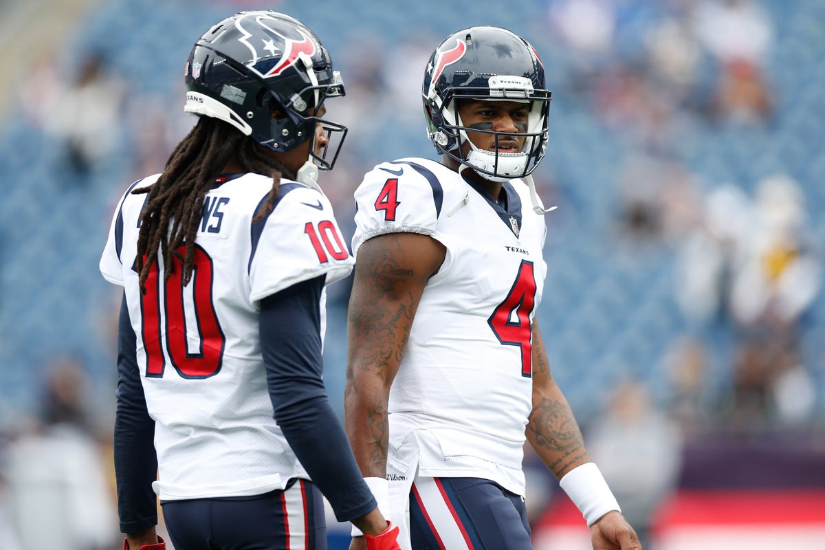 Houston Texans wide receiver DeAndre Hopkins and quarterback Deshaun Watson talk before the game against the New England Patriots at Gillette Stadium.