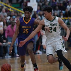 Waukegan’s Bryant Brown (25) tries to keep Fremd’s Bryce Hopkins (24) away from the ball, Wednesday  03-06-19. Worsom Robinson/For the Sun-Times.