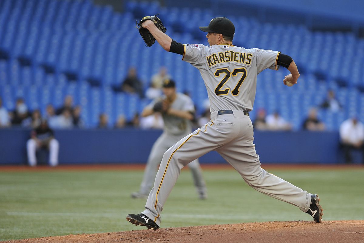 TORONTO, CANADA - JUNE 30:  Jeff Karstens #27 of the Pittsburgh Pirates delivers a pitch during MLB interleague game action against the Toronto Blue Jays June 30, 2011 at Rogers Centre in Toronto, Ontario, Canada. (Photo by Brad White/Getty Images)