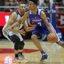 Utah Jazz guard Dante Exum (11) defends Philadelphia 76ers guard Markelle Fultz (7) as the Utah Jazz and the Philadelphia 76ers play in Summer League action in the Huntsman Center at the University of Utah in Salt Lake City on Wednesday, July 5, 2017.