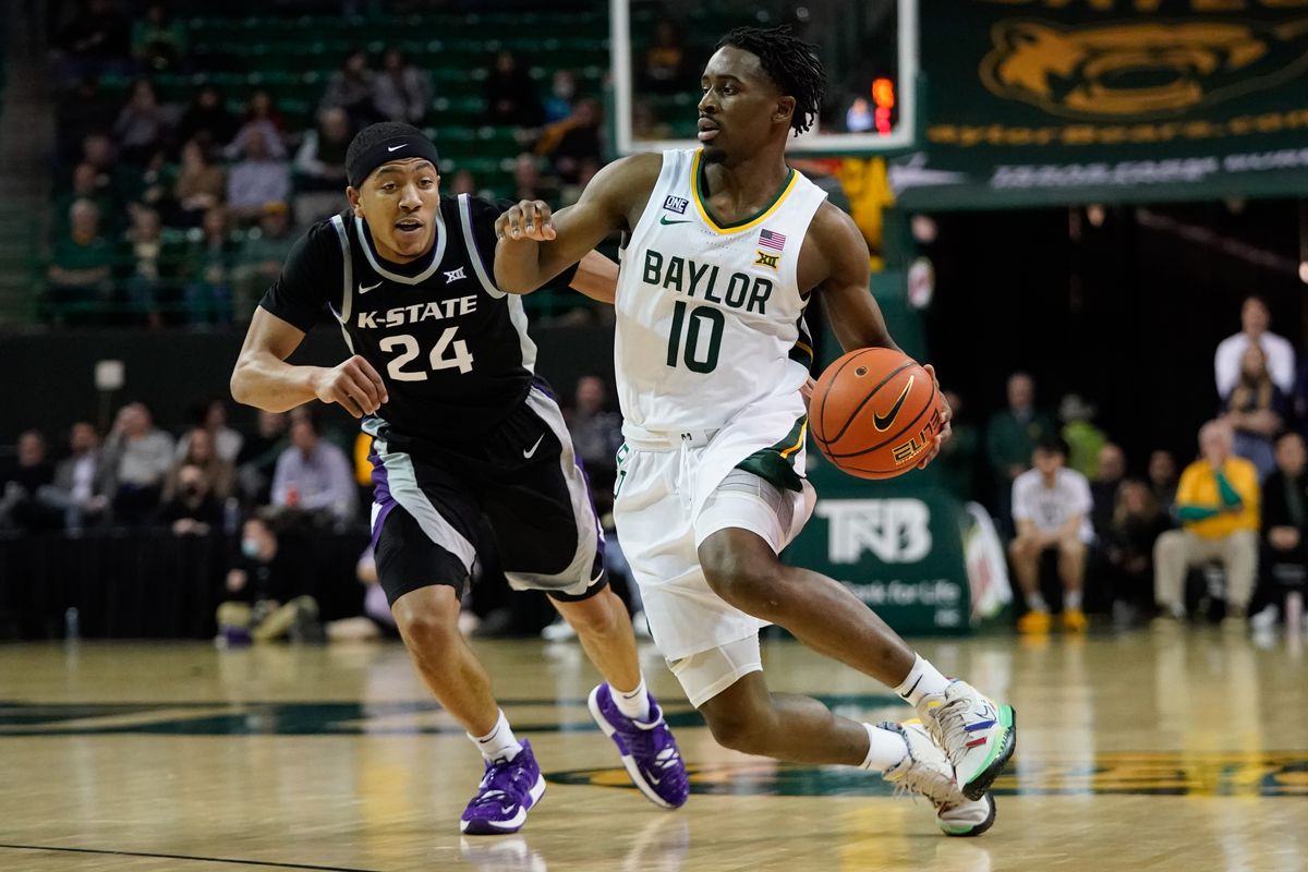 Baylor Bears guard Adam Flagler drives to the basket past Kansas State Wildcats guard Nijel Pack during the first half at Ferrell Center.&nbsp;
