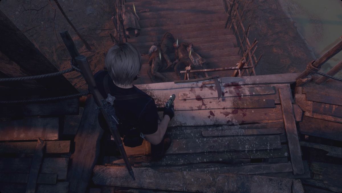 Resident Evil 4&nbsp;remake&nbsp;Leon looking down a ladder at a pile of bodies.