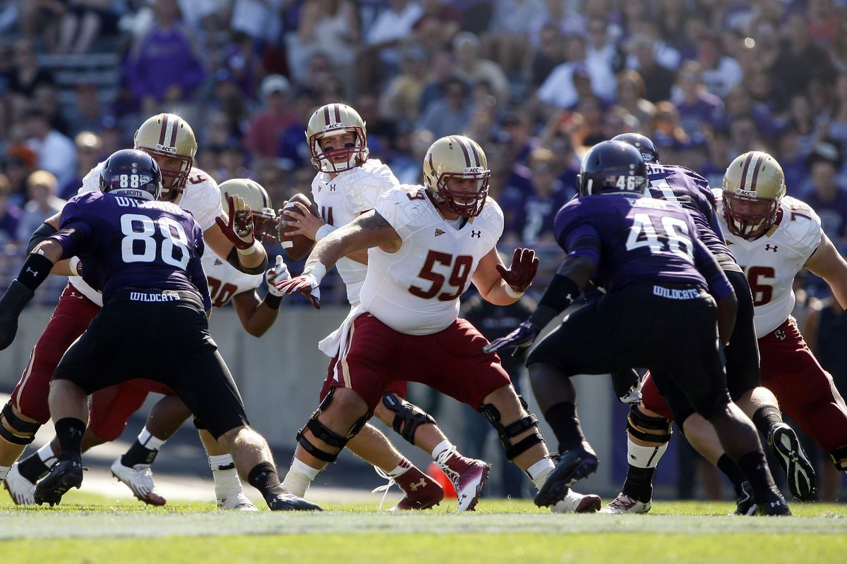 Sep 15, 2012; Evanston, IL, USA; Boston College Eagles quarterback Chase Rettig (11) drops back to pass against the Northwestern Wildcats during the first quarter at Ryan Field.  Mandatory Credit: Jerry Lai-US PRESSWIRE