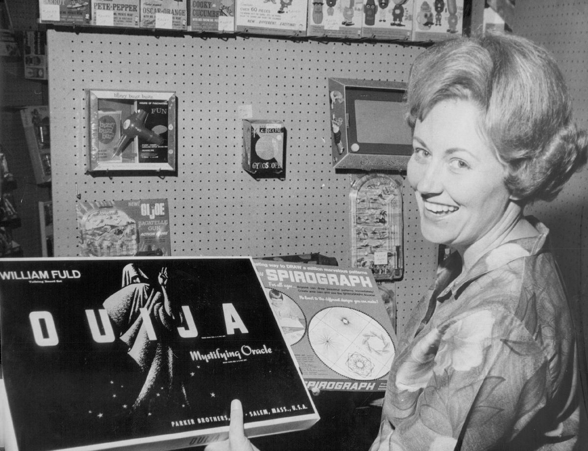 In 1967, a woman shows off her Ouija set, when it was just another fun game.