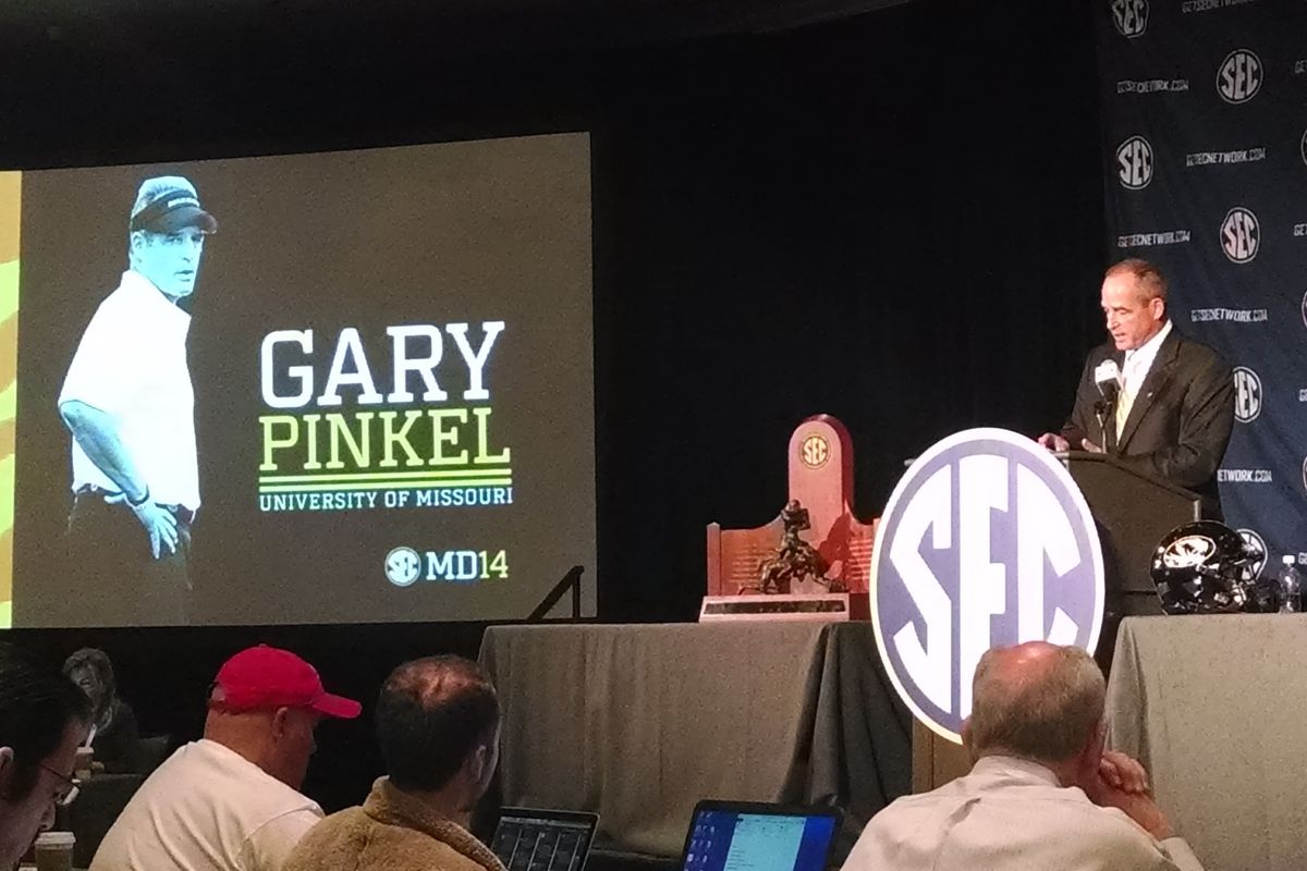 Old Gary Pinkel haircut is very disappointed in new Gary Pinkel haircut.
