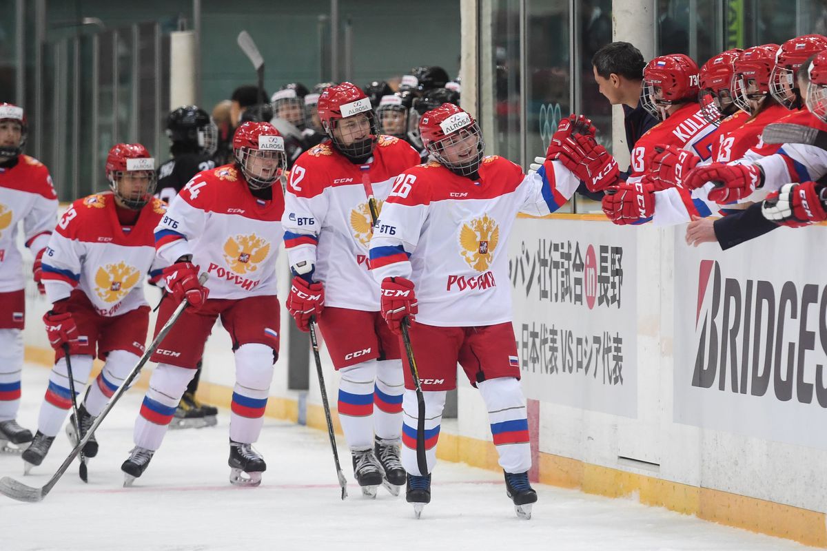 Ekaterina Dobrodeyeva #26 of Russia celebrates a third period goal with teammates during the Women’s ice hockey friendly match between Japan and Russia at Big Hat on December 24, 2017 in Nagano, Japan.