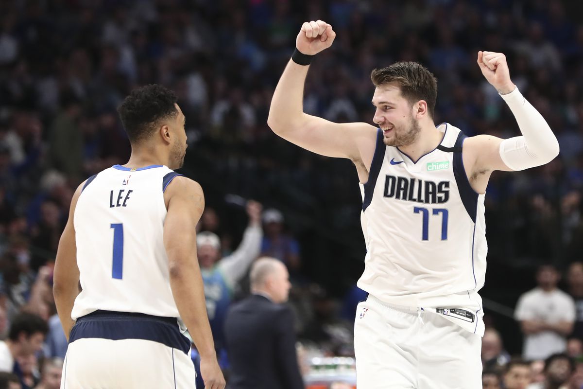 Dallas Mavericks guard Luka Doncic reacts after making a free throw during the second half against the Denver Nuggets at American Airlines Center.