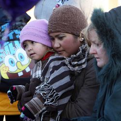 People stop at a memorial at Emma L. Carson Elementary School in Puyallup, Wash., Monday, Feb. 6, 2012.
