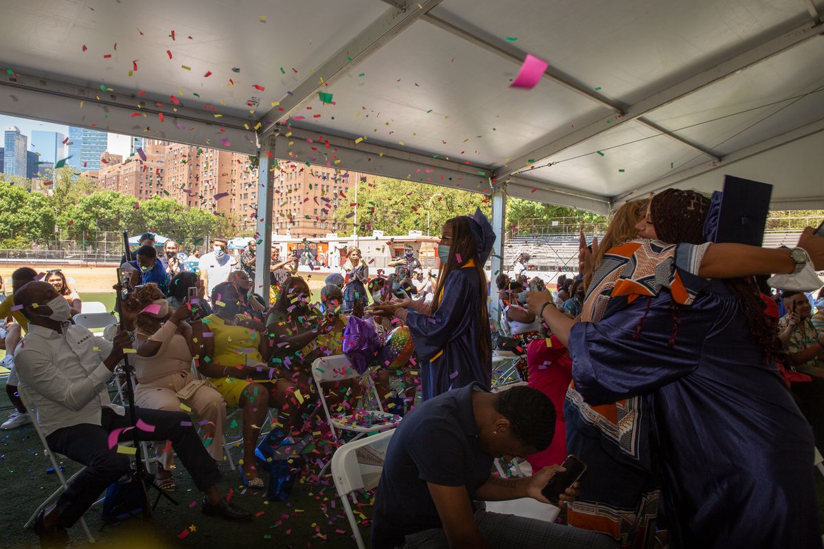 Students and family celebrate after a graduation ceremony for the Urban Assembly School for Emergency Management in the Lower East Side on Thursday, June 24, 2021.