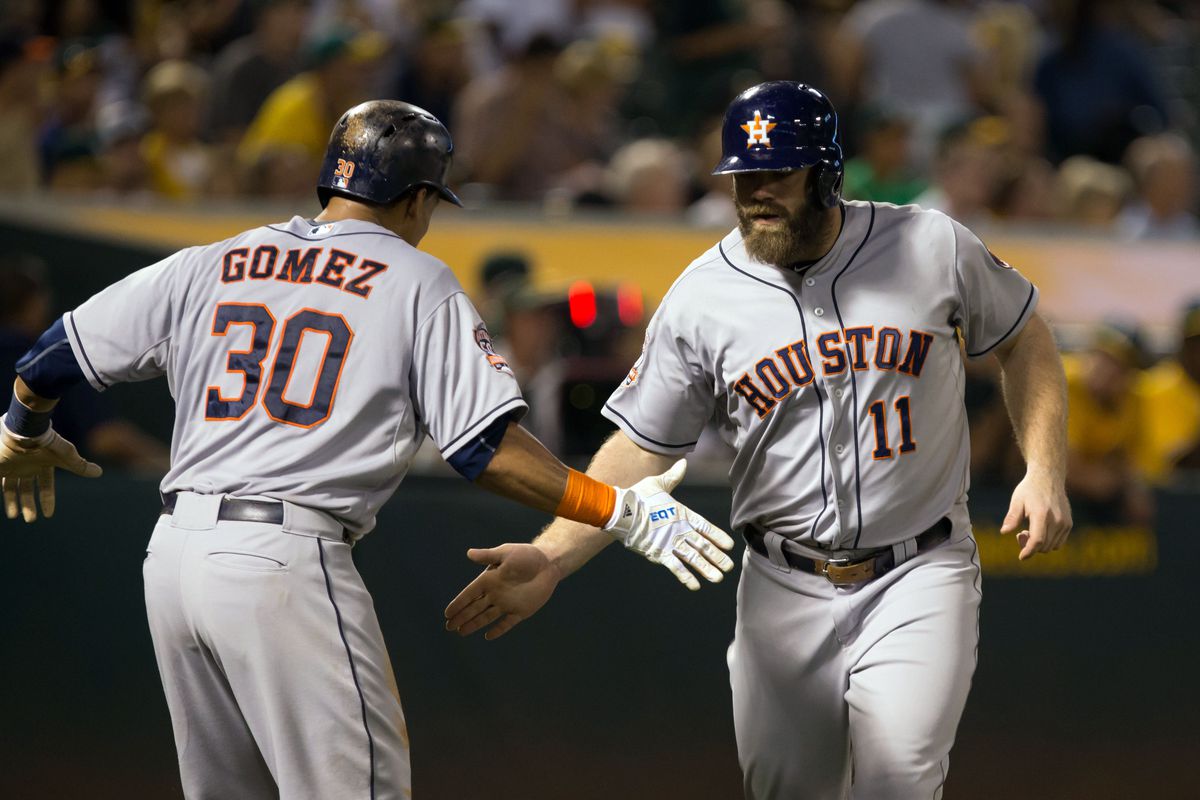 Evan Gattis and Carlos Gomez each homered - part of a four home run barrage from the Astros offense