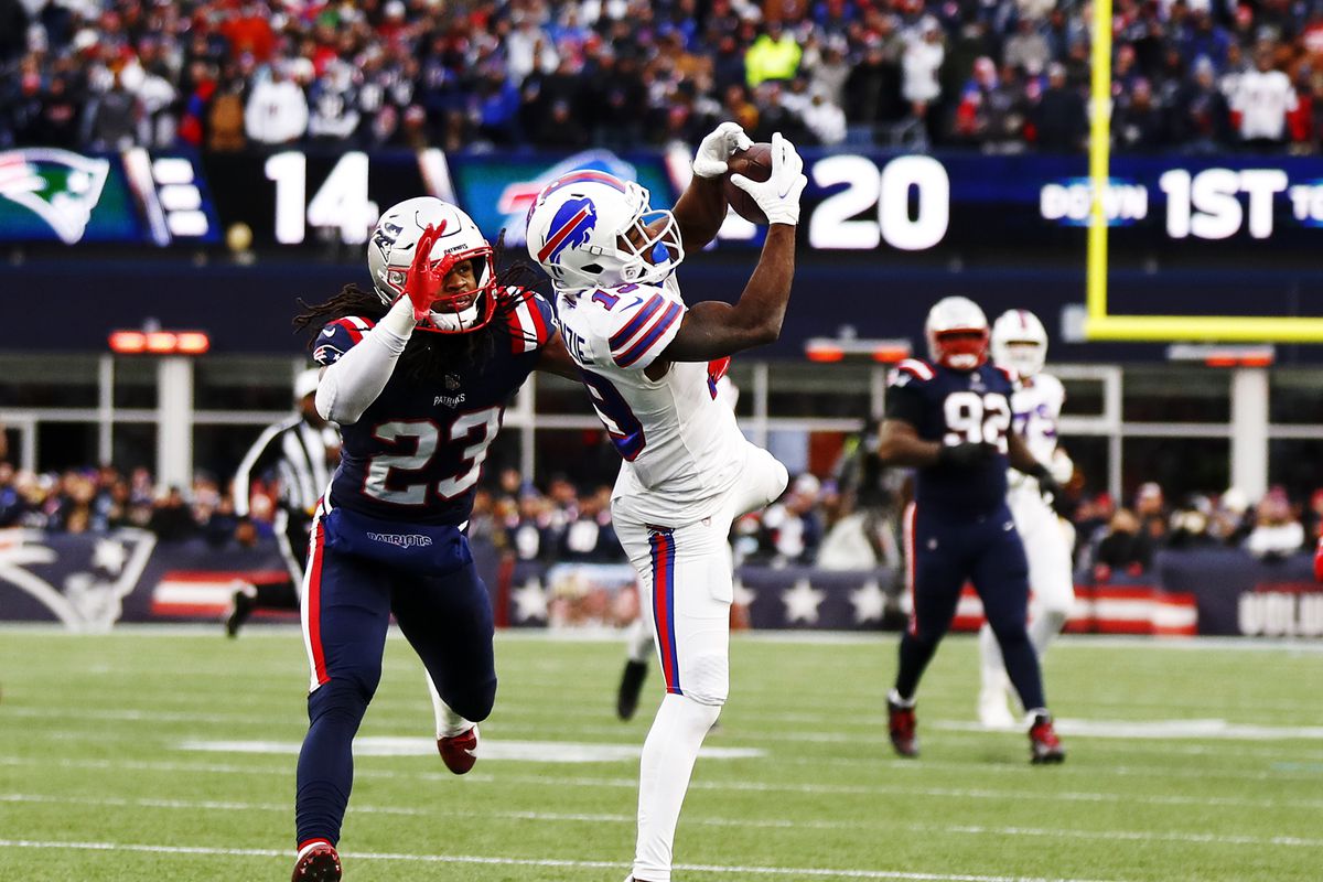 Wide receiver Isaiah McKenzie #19 of the Buffalo Bills makes the catch during the fourth quarter of the game against the New England Patriots at Gillette Stadium on December 26, 2021 in Foxborough, Massachusetts.