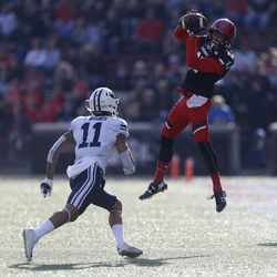 Cincinnati wide receiver Devin Gray, right, catches a pass in front of Brigham Young defensive back Troy Warner (11) during the first half of an NCAA college football game, Saturday, Nov. 5, 2016, in Cincinnati. (AP Photo/Gary Landers)