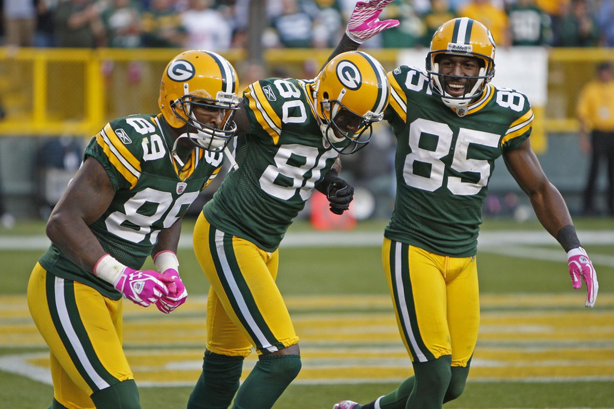 Donald Driver #80 celebrates with teammates James Jones #89 and Greg Jennings #85 of the Green Bay Packers after scoring a touchdown.  (Photo by Matt Ludtke /Getty Images)