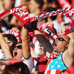USA fans cheer as the United States and Honduras play Tuesday, June 18, 2013 at Rio Tinto Stadium.