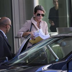 Sandra Arroyo Salgado, ex-wife of late prosecutor Alberto Nisman, leaves Le Parc towers, where police investigators conduct forensic analysis in the apartment where the special prosecutor lived and was found dead almost a month ago, in Buenos Aires, Argentina, Friday, Feb. 13, 2015. The prosecutor who inherited a high-profile case against Argentine President Cristina Fernandez reaffirmed the accusations, formally renewing the investigation into whether the president helped Iranian officials cover up their alleged role in the 1994 bombing of a Jewish community center. 