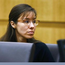 Defendant Jodi Arias looks to her family during closing arguments during her trial on Friday, May 3, 2013 at Maricopa County Superior Court in Phoenix.  Arias is charged with first-degree murder in the stabbing and shooting death of Travis Alexander, 30, in his suburban Phoenix home in June 2008. 