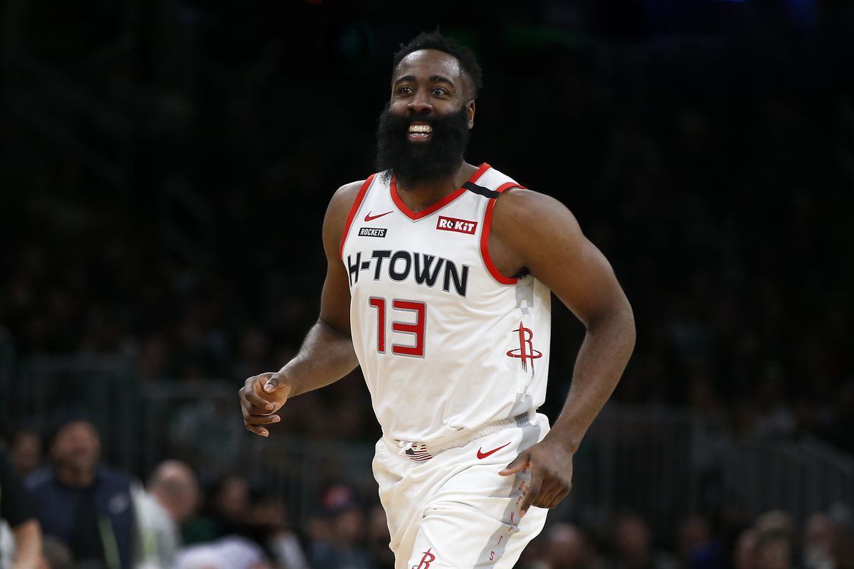 Houston Rockets guard James Harden smiles after scoring against the Boston Celtics during the second half at TD Garden.