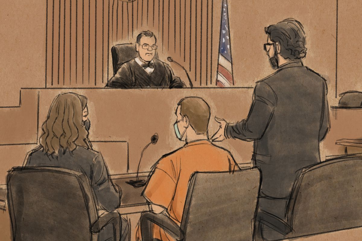 In this courtroom sketch, attorney Eric Nelson, right, speaks to U.S. District Judge Paul Magnuson during a hearing where former Minneapolis police officer Derek Chauvin, center, pleaded guilty to a federal charge of violating George Floyd’s civil rights on Wednesday, Dec. 15, 2021 in St. Paul, Min. Chauvin admitted for the first time that he kept his knee on Floyd’s neck — even after he became unresponsive — resulting in the Black man’s death.