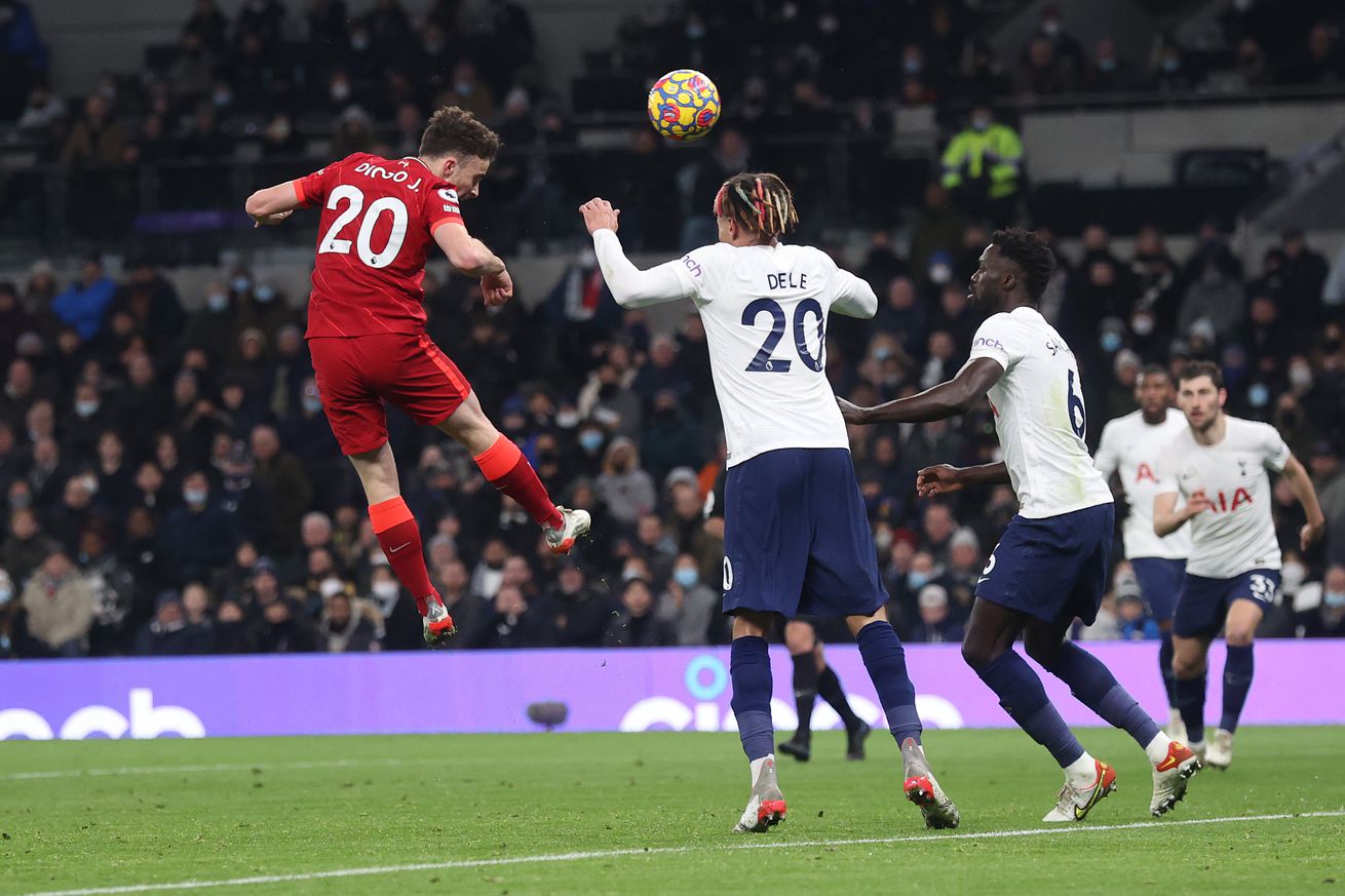 Diogo Jota of Liverpool scores their side’s first goal during the Premier League match between Tottenham Hotspur and Liverpool at Tottenham Hotspur Stadium on December 19, 2021 in London, England.