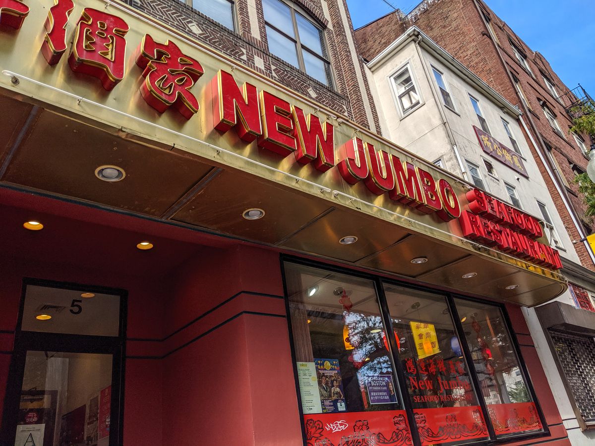 Signage for New Jumbo Seafood Restaurant in Boston’s Chinatown —&nbsp;raised red lettering on a gold background