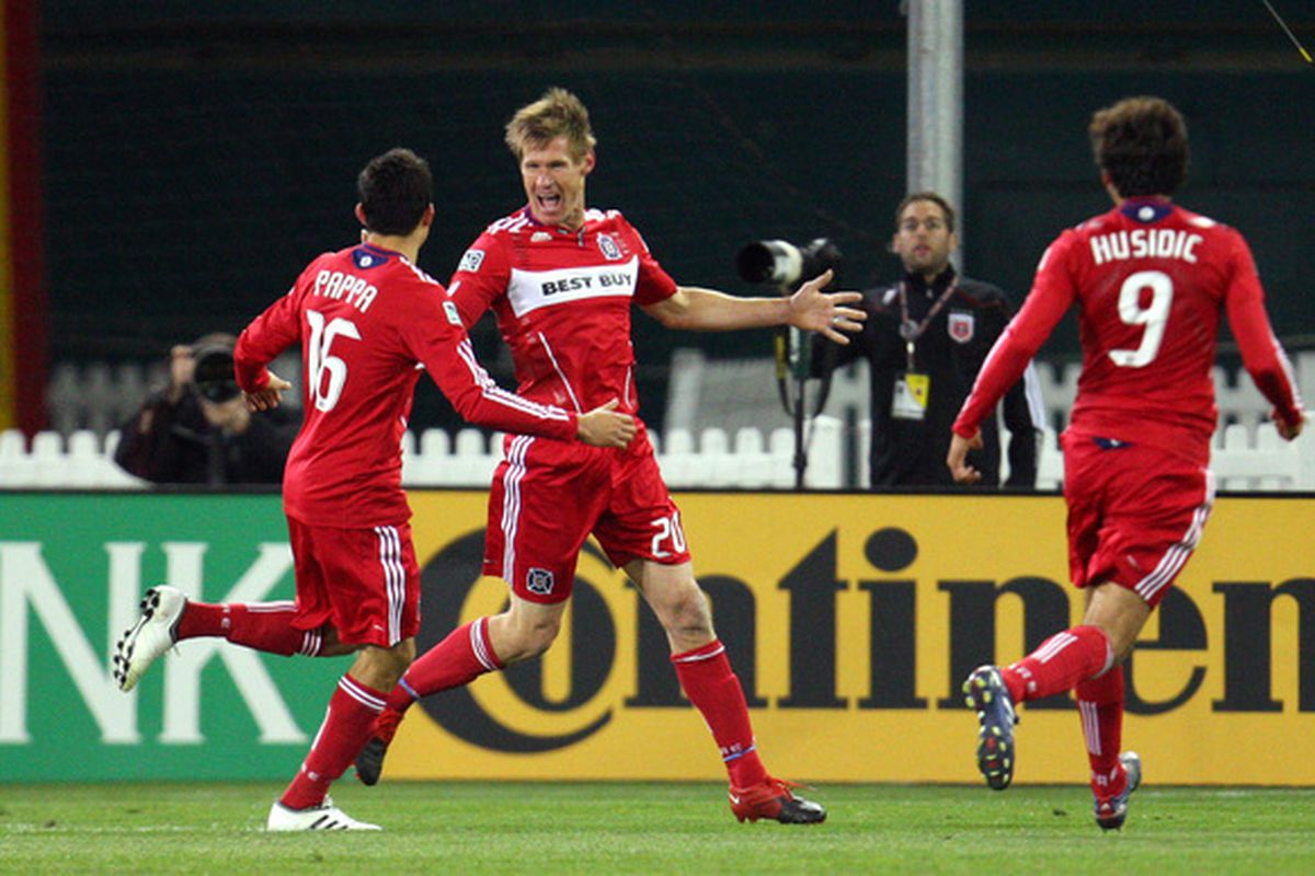 WASHINGTON - APRIL 17: Brian McBride #20 of the Chicago Fire celebrates after scoring the second goal against D.C. United at RFK Stadium on April 17, 2010 in Washington, DC. (Photo by Ned Dishman/Getty Images)