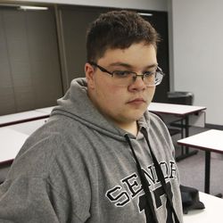 FILE - In this Monday, March 6, 2017, file photo, Gloucester County High School senior Gavin Grimm, a transgender student, arrives for a news conference in Richmond, Va. The 4th U.S. Circuit Court of Appeals had scheduled arguments for September in Grimm’s case against the Gloucester County School Board to use the boy’s bathroom at his high school. But the 4th Circuit said Wednesday, Aug. 2, that it will delay next month’s arguments and send the case back to the district court so the judge can decide whether the case is now moot because Grimm recently graduated. (AP Photo/Steve Helber, File)