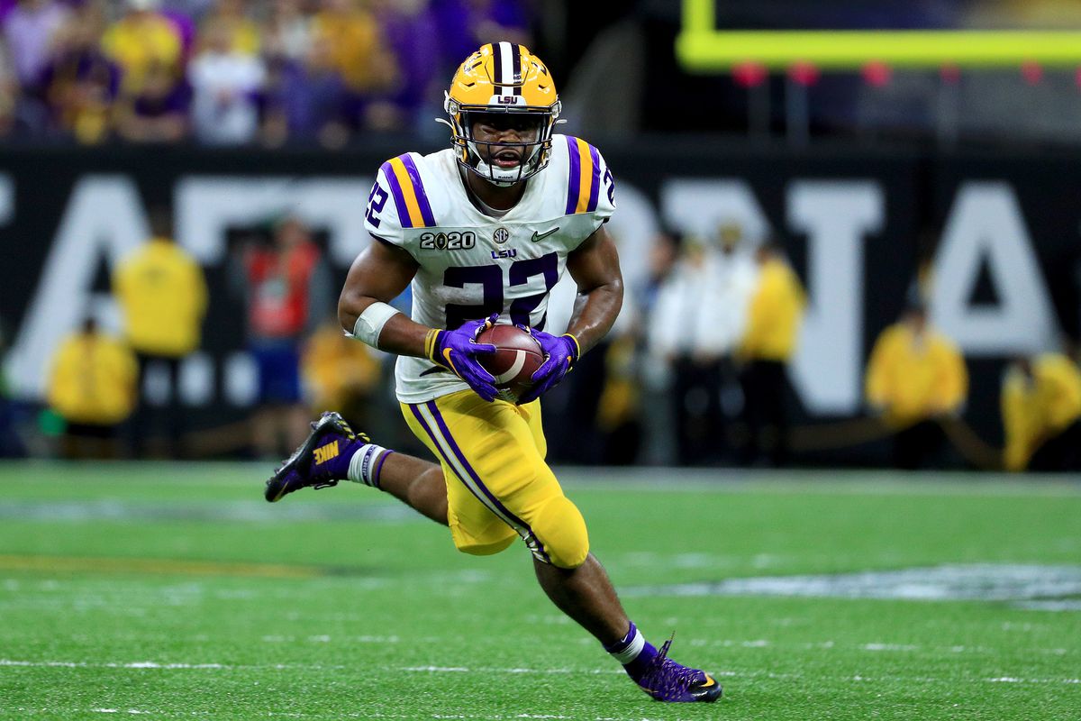Clyde Edwards-Helaire #22 of the LSU Tigers runs the ball against the Clemson Tigers during the fourth quarter in the College Football Playoff National Championship game at Mercedes Benz Superdome on January 13, 2020 in New Orleans, Louisiana.