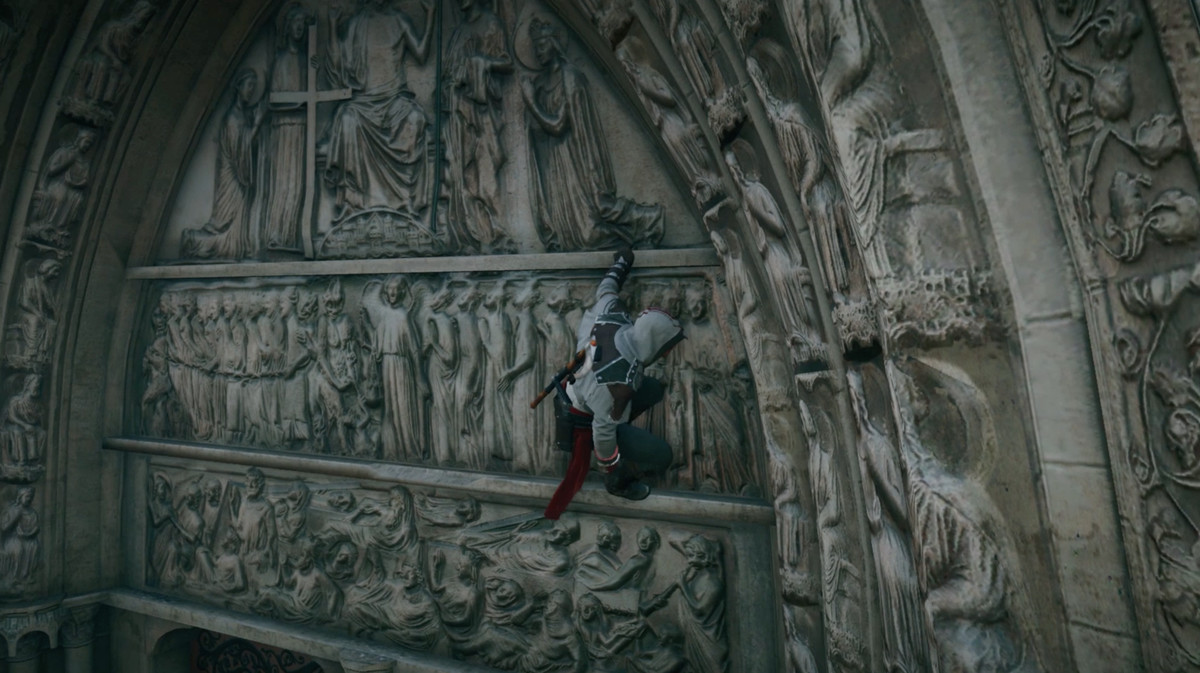 The carvings above one of Notre-Dame’s doors in Assassin’s Creed Unity