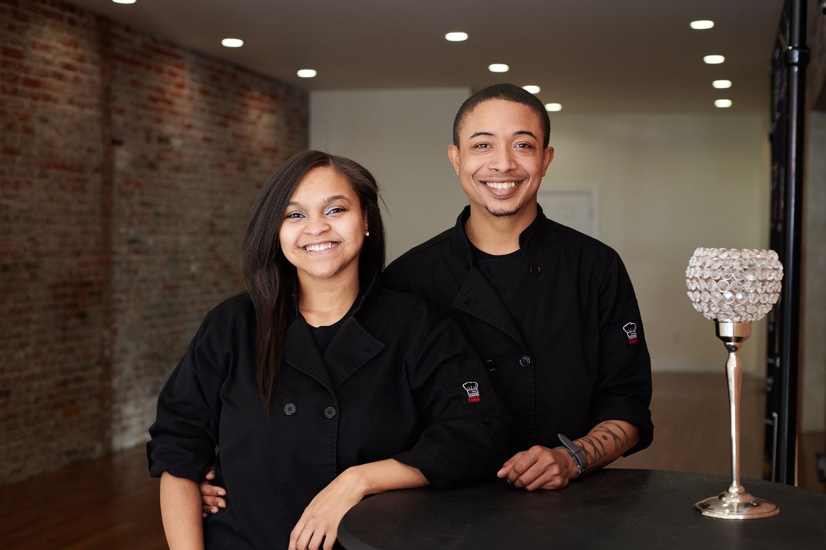 woman and man in black chef’s coats