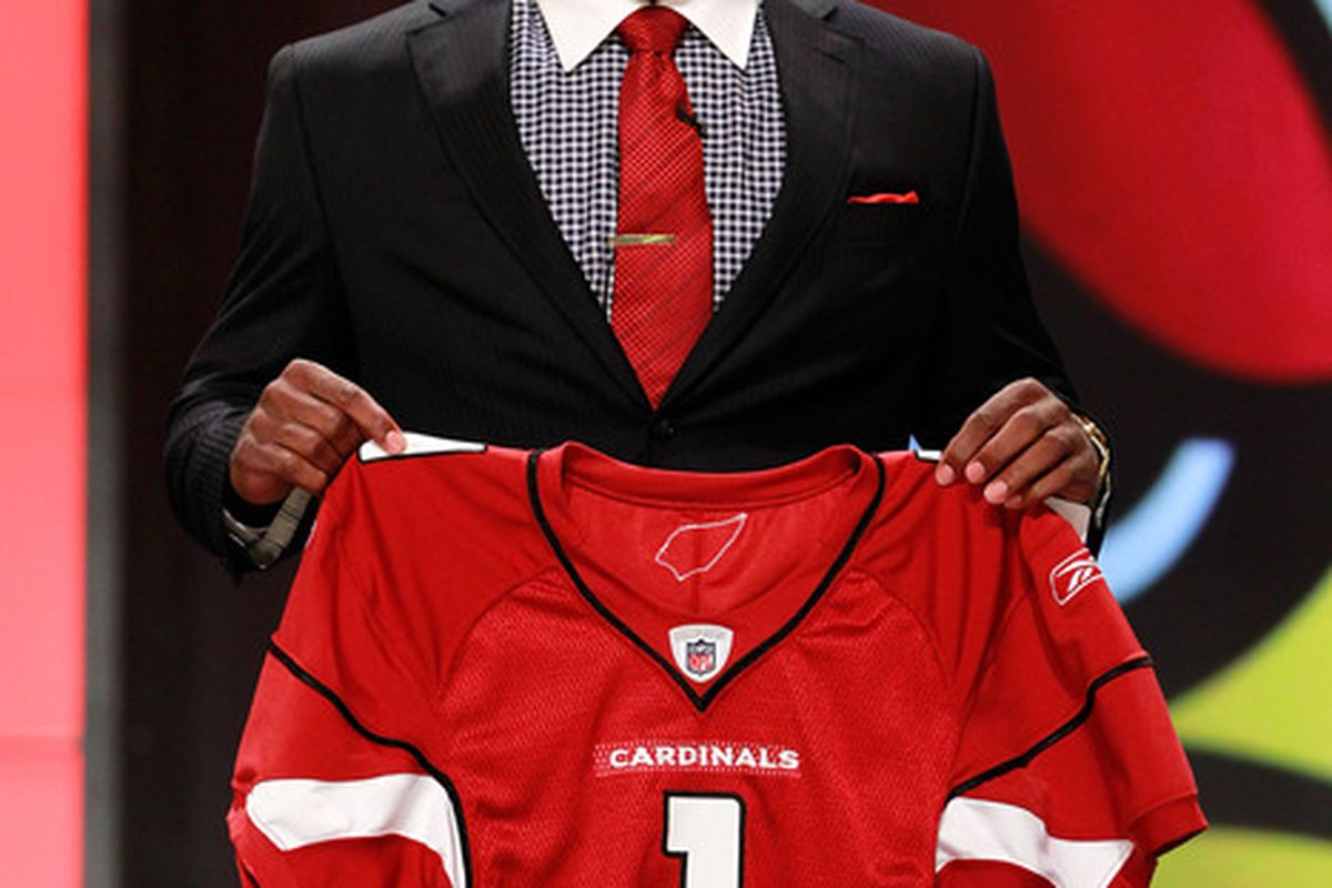 NEW YORK, NY - APRIL 28:  Patrick Peterson, #5 overall pick by the Arizona Cardinals, holds up his jersey on stage during the 2011 NFL Draft at Radio City Music Hall on April 28, 2011 in New York City.  (Photo by Chris Trotman/Getty Images)