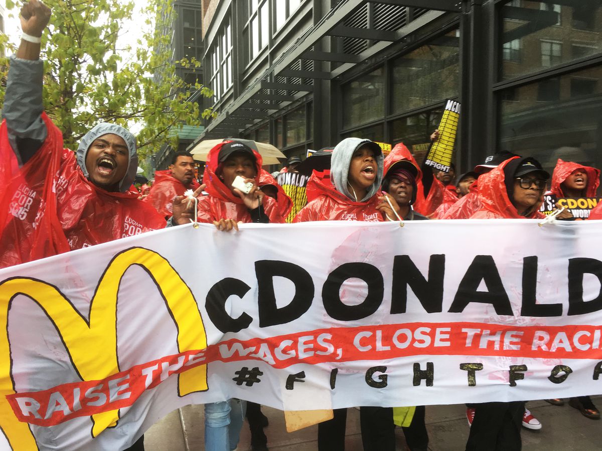 Protesters in favor of a higher minimum wage march outside the McDonald’s headquarters in the West Loop on May 21, 2018. | Stefano Esposito/Sun-Times