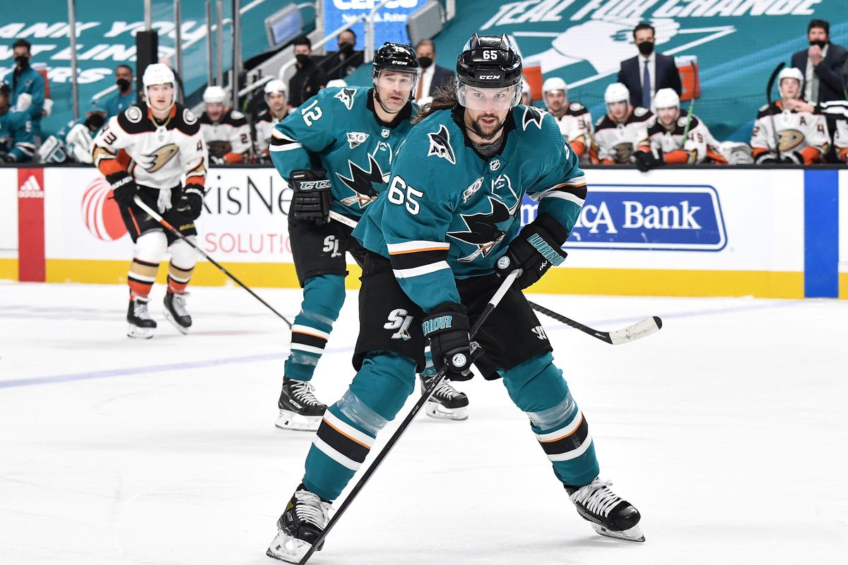 Erik Karlsson #65 of the San Jose Sharks skates ahead with the puck against the Anaheim Ducks at SAP Center on April 12, 2021 in San Jose, California.