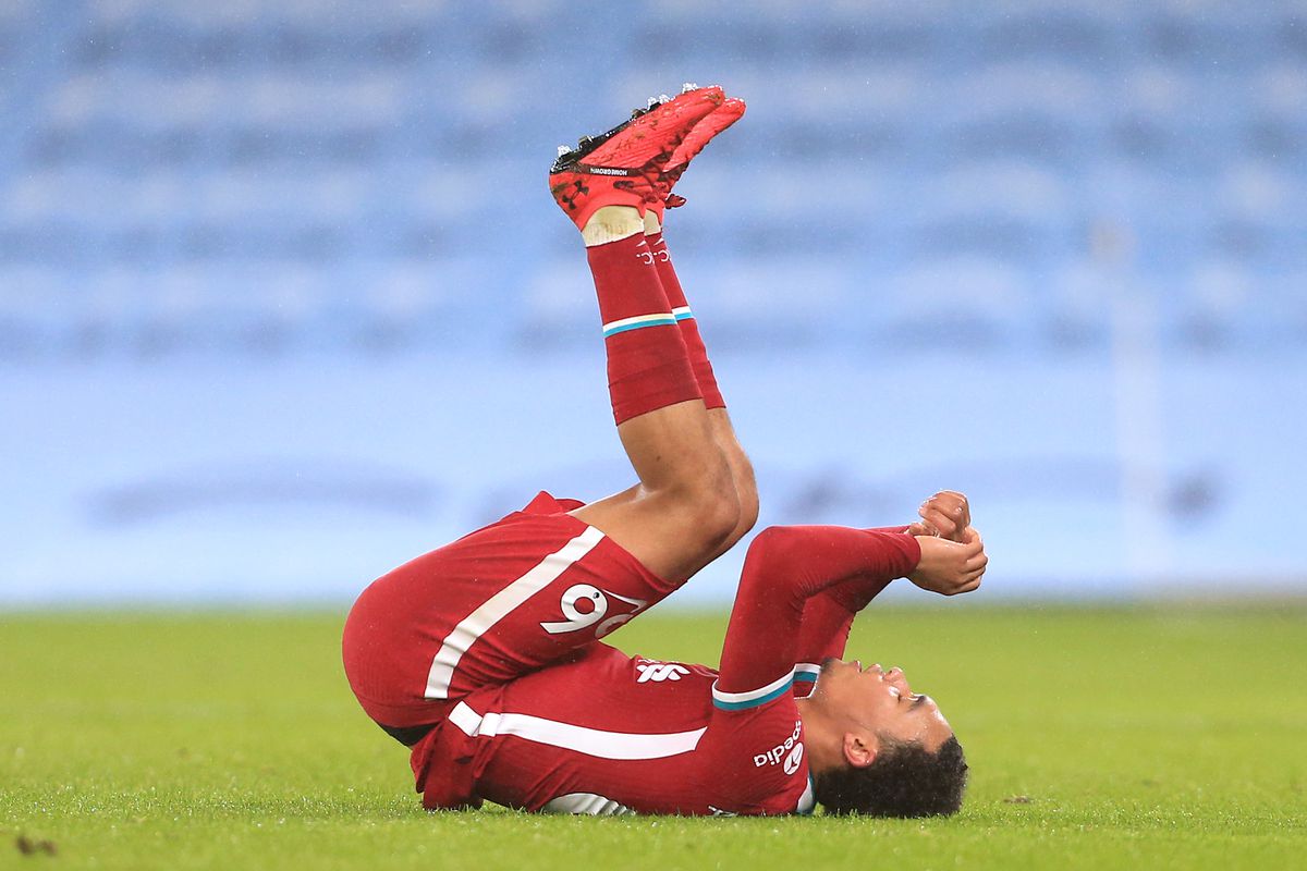 Alexander-Arnold lies on the ground in pain after injuring his calf against Manchester City in November. He has since returned to the side.