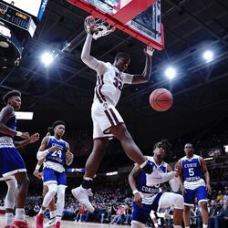 Belleville West’s EJ Liddell (32) dunks in the first half against Curie, Friday 03-15-19. Worsom Robinson/For the Sun-Times